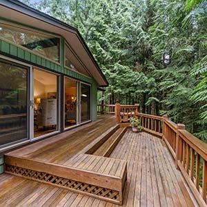 house with wooden outdoor deck